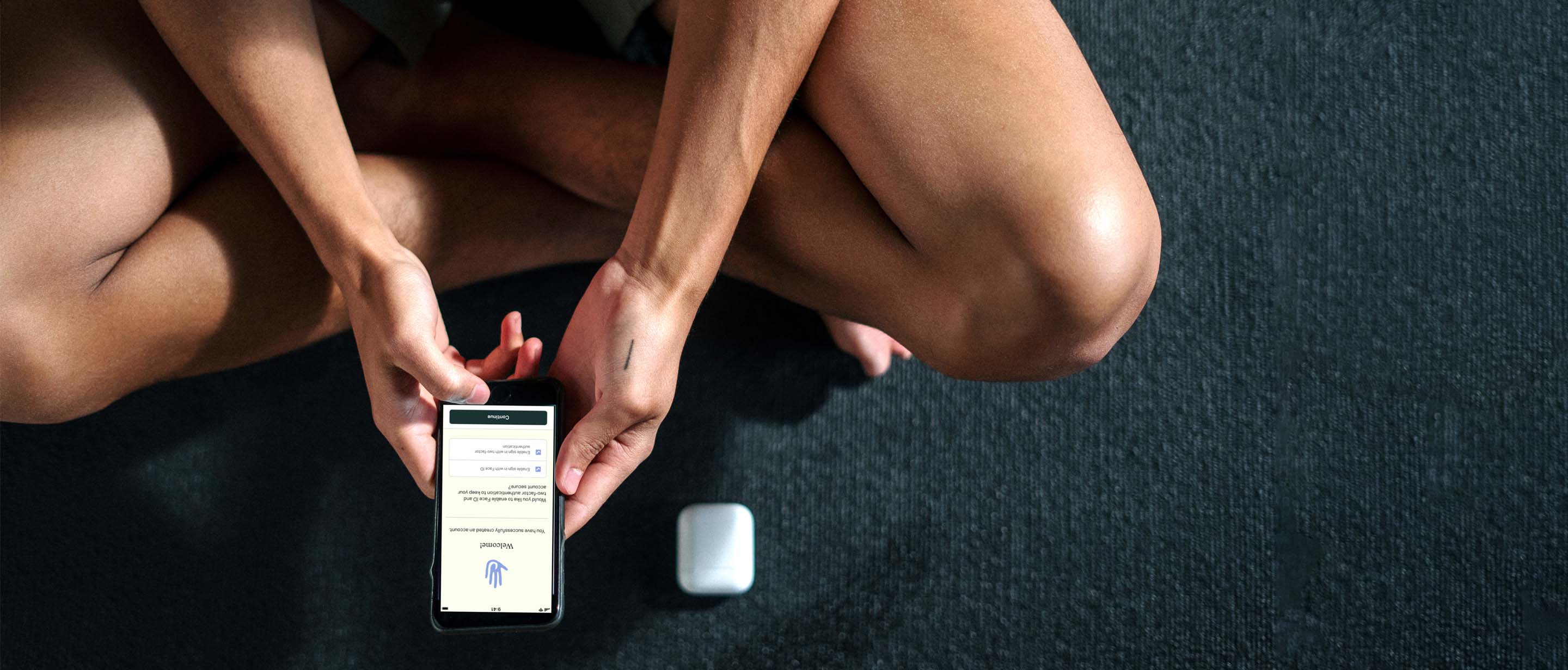 Women with JuvYou Healthy Aging app on her phone
