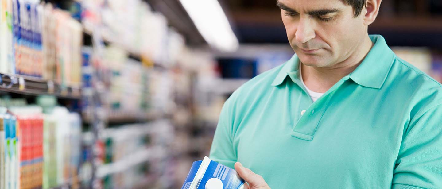 Man checking food label