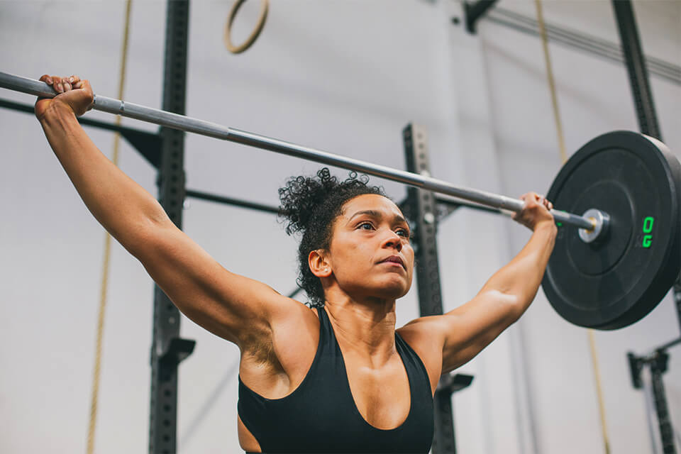 Woman weight training